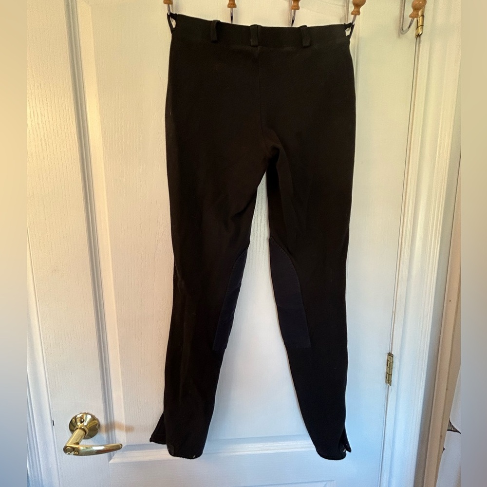 Women’s Tuffrider black riding pants, size 26 waist. Cotton Lycra blend.